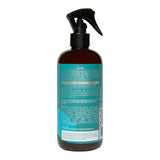 Brown bottle with a black spray nozzle on a white background